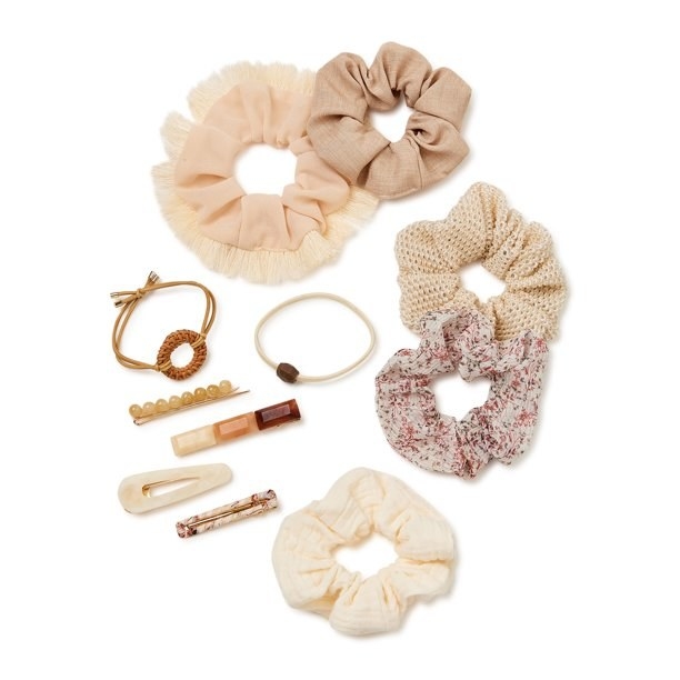 A set of neutral hair accessories including clips and pony tail holders.