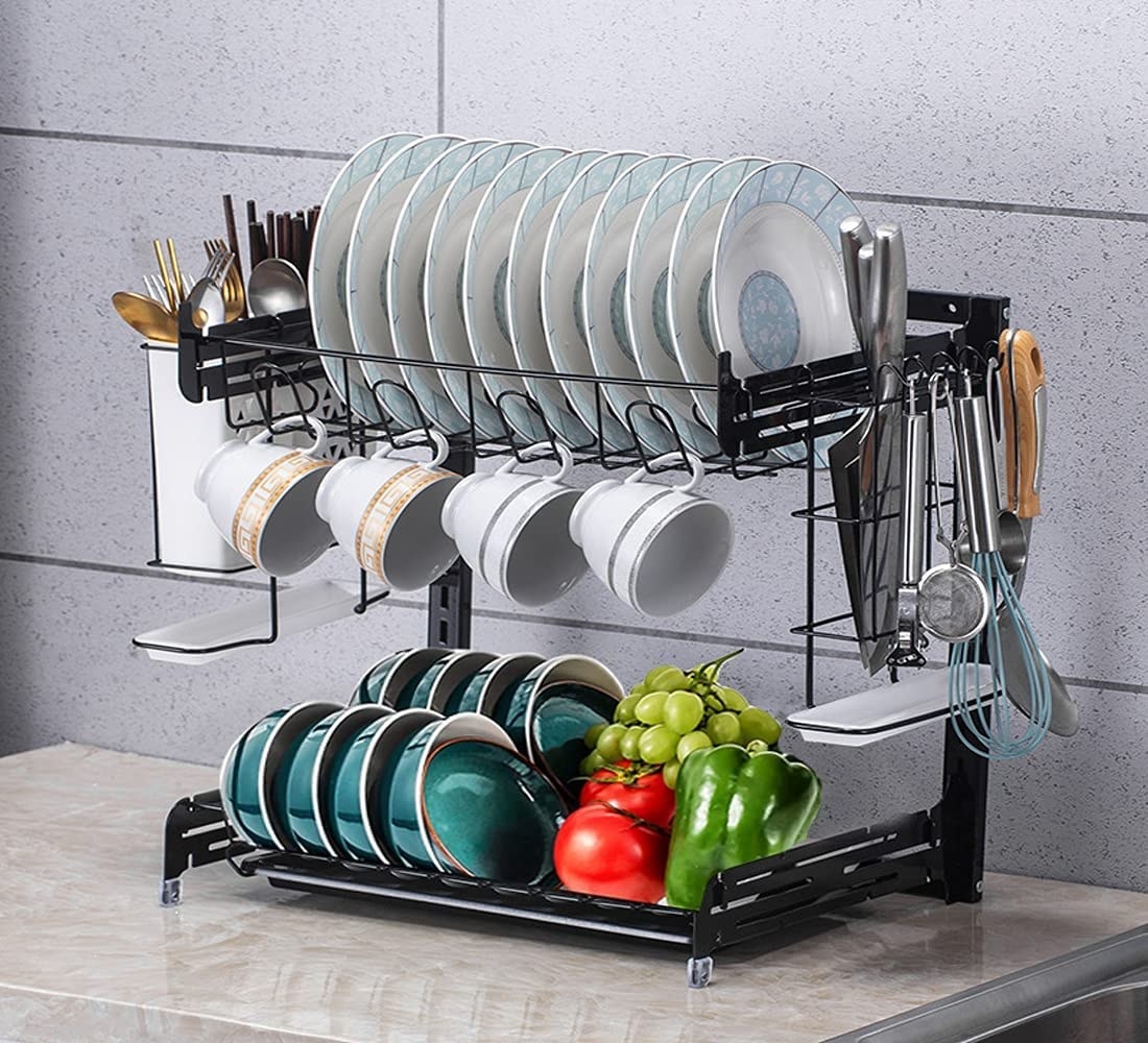 The rack filled with dishes and cooking utensils