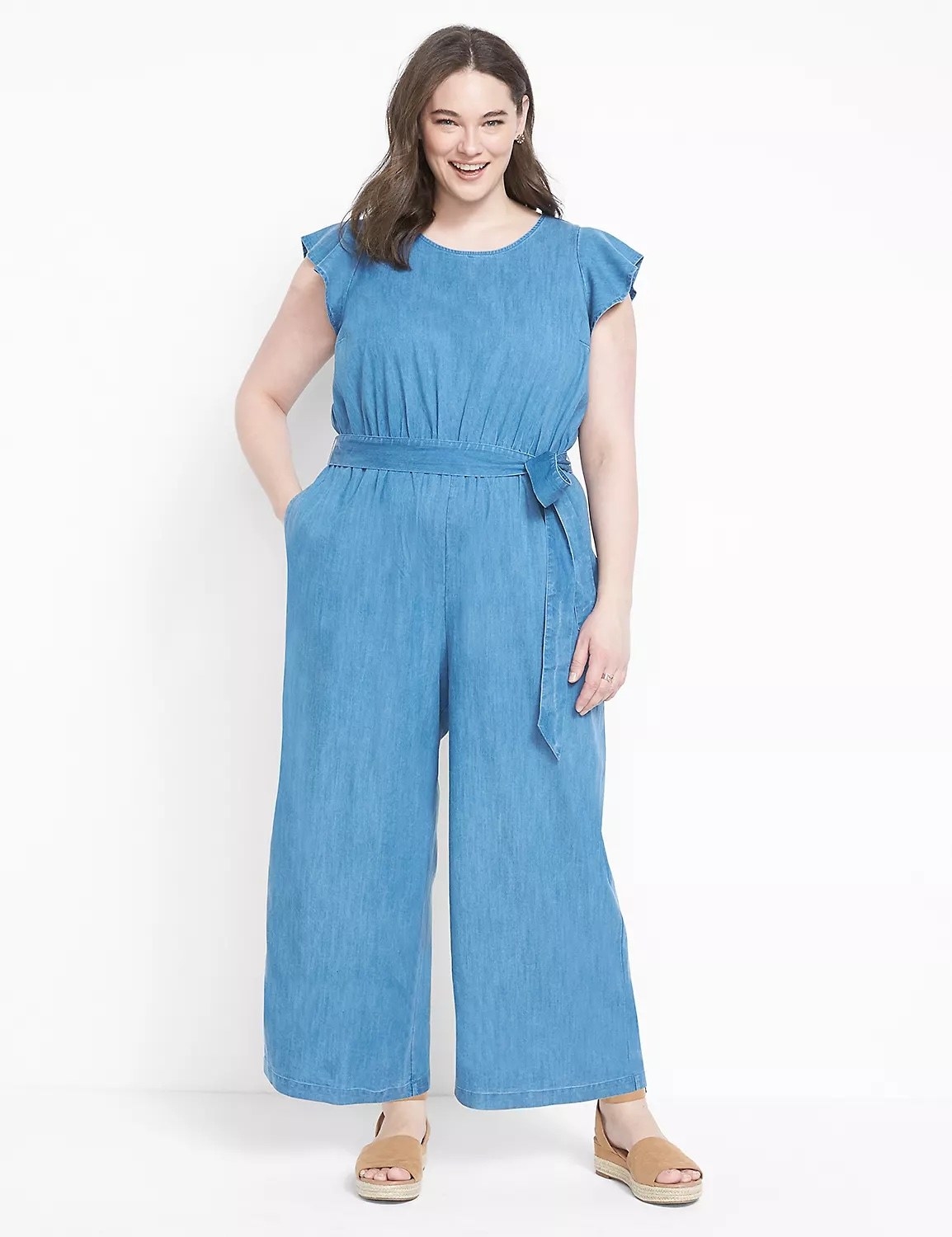 Model wearing blue jumpsuit