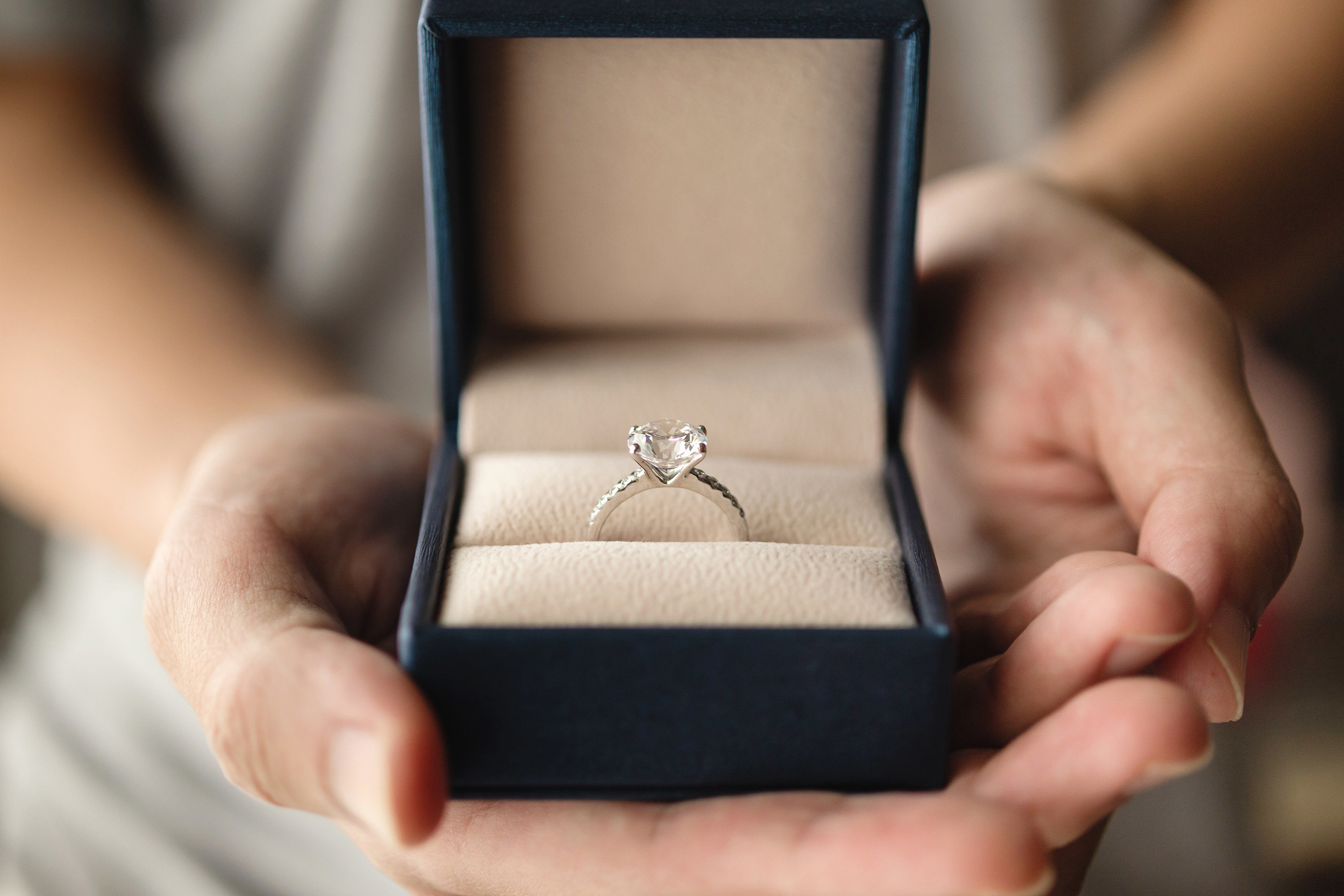An engagement ring in a box