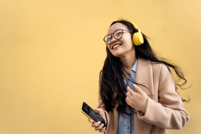 A woman listening to music