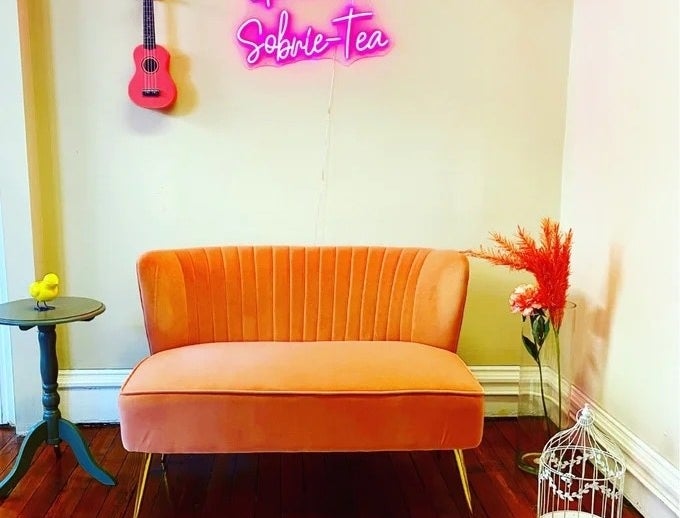 orange couch in a room
