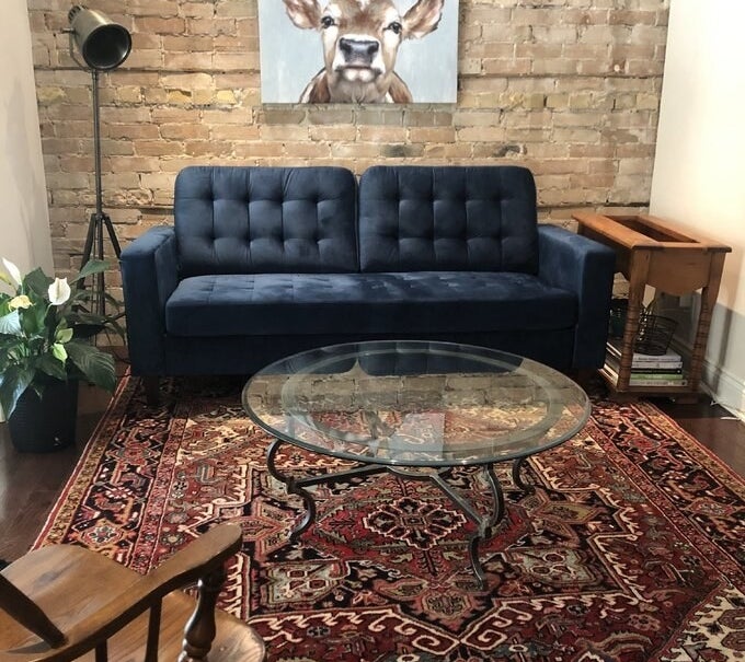 reviewer photo of the blue couch