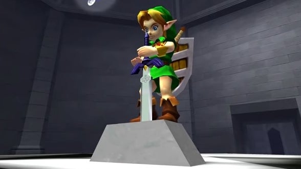 Young Link grabbing the Master Sword in &quot;The Legend of Zelda: Ocarina of Time 3D&quot;