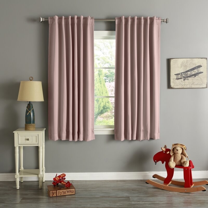 the curtains in dusty pink