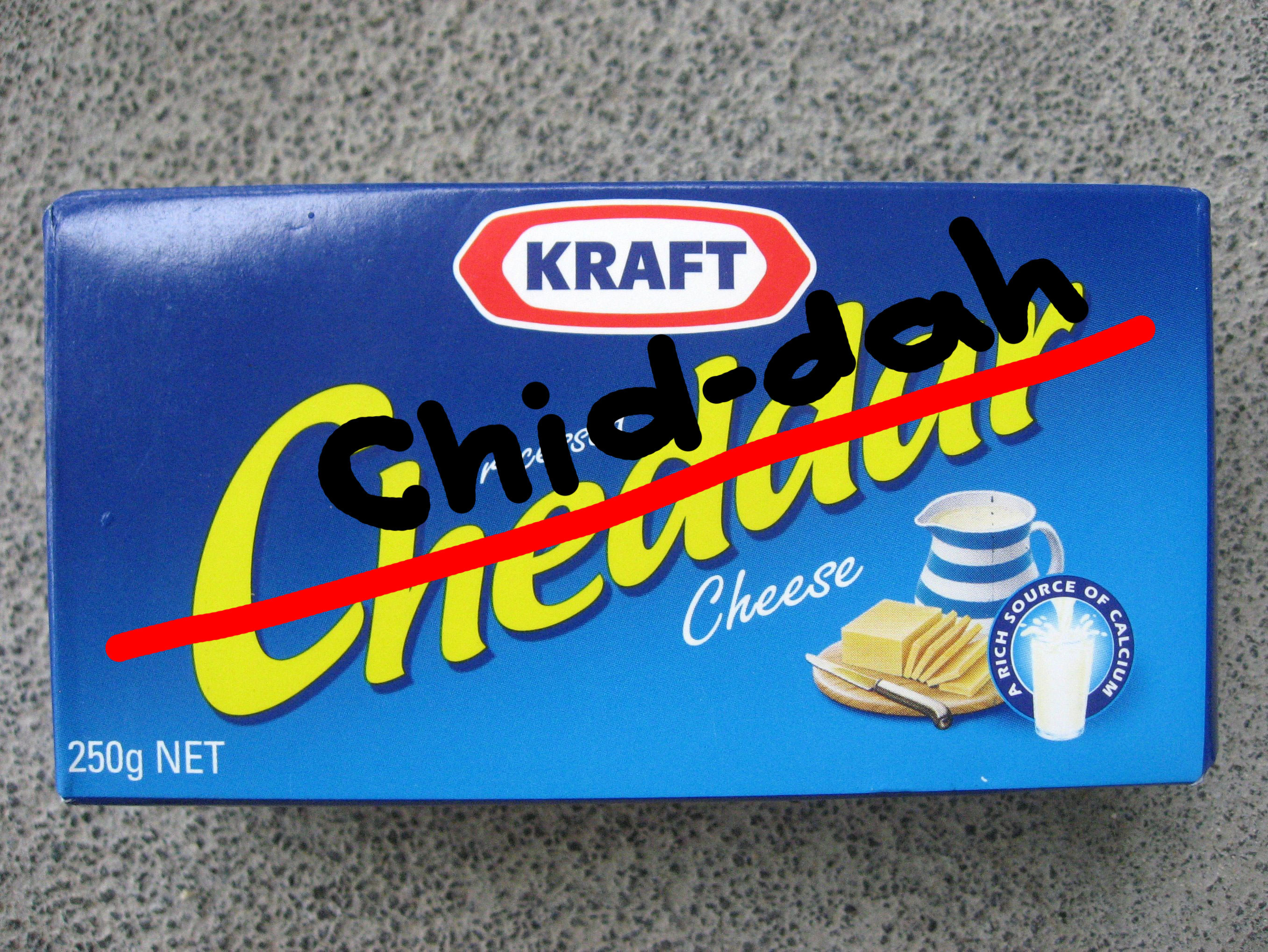 A package of Kraft Cheddar Cheese with &quot;Cheddar&quot; crossed out and replaced by &quot;Chid-dah&quot;