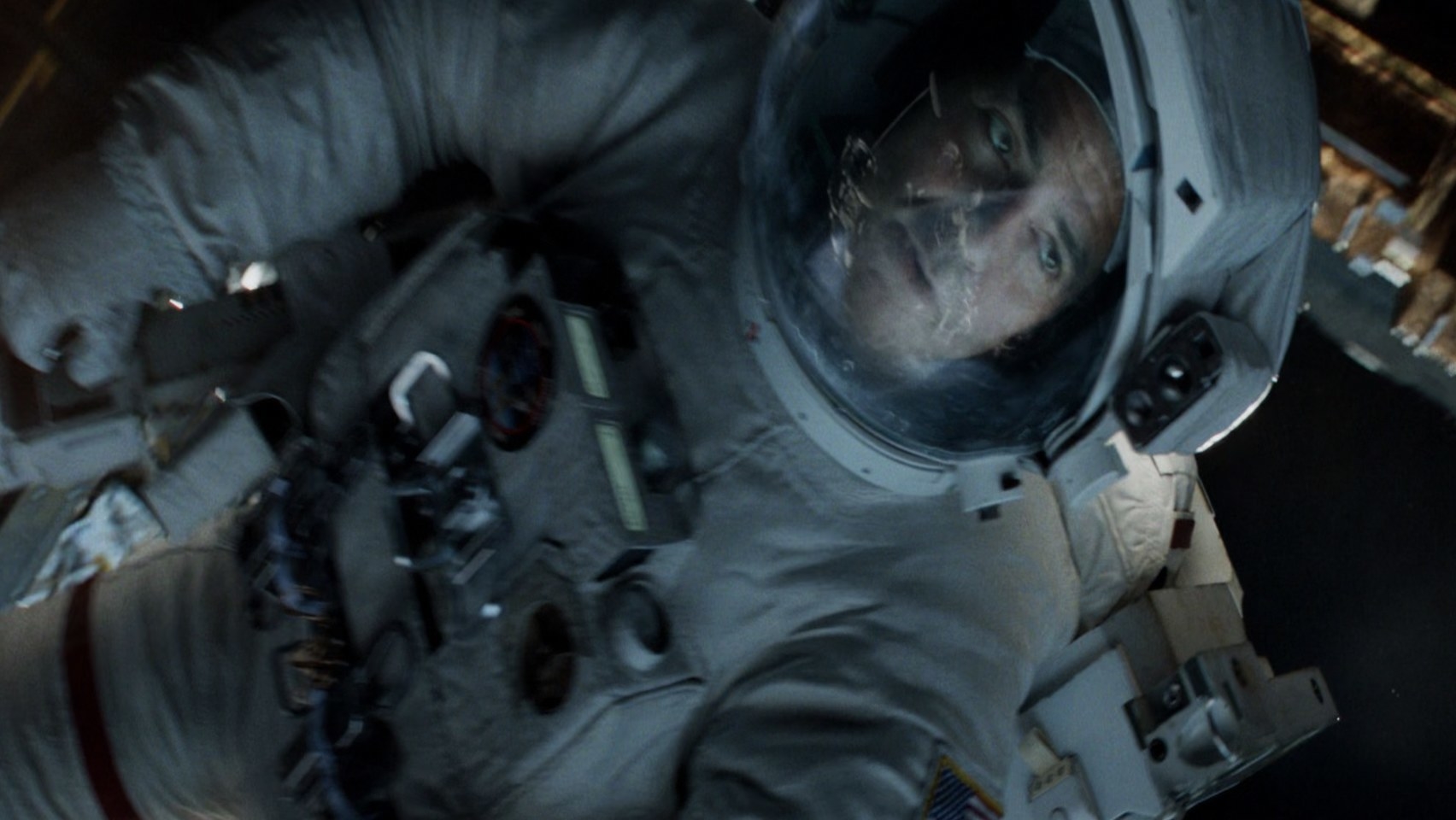 The CGI reflection in Matt Kowalski&#x27;s space helmet