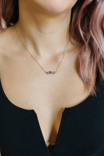 model wearing a herkimer diamond pendant necklace necklace