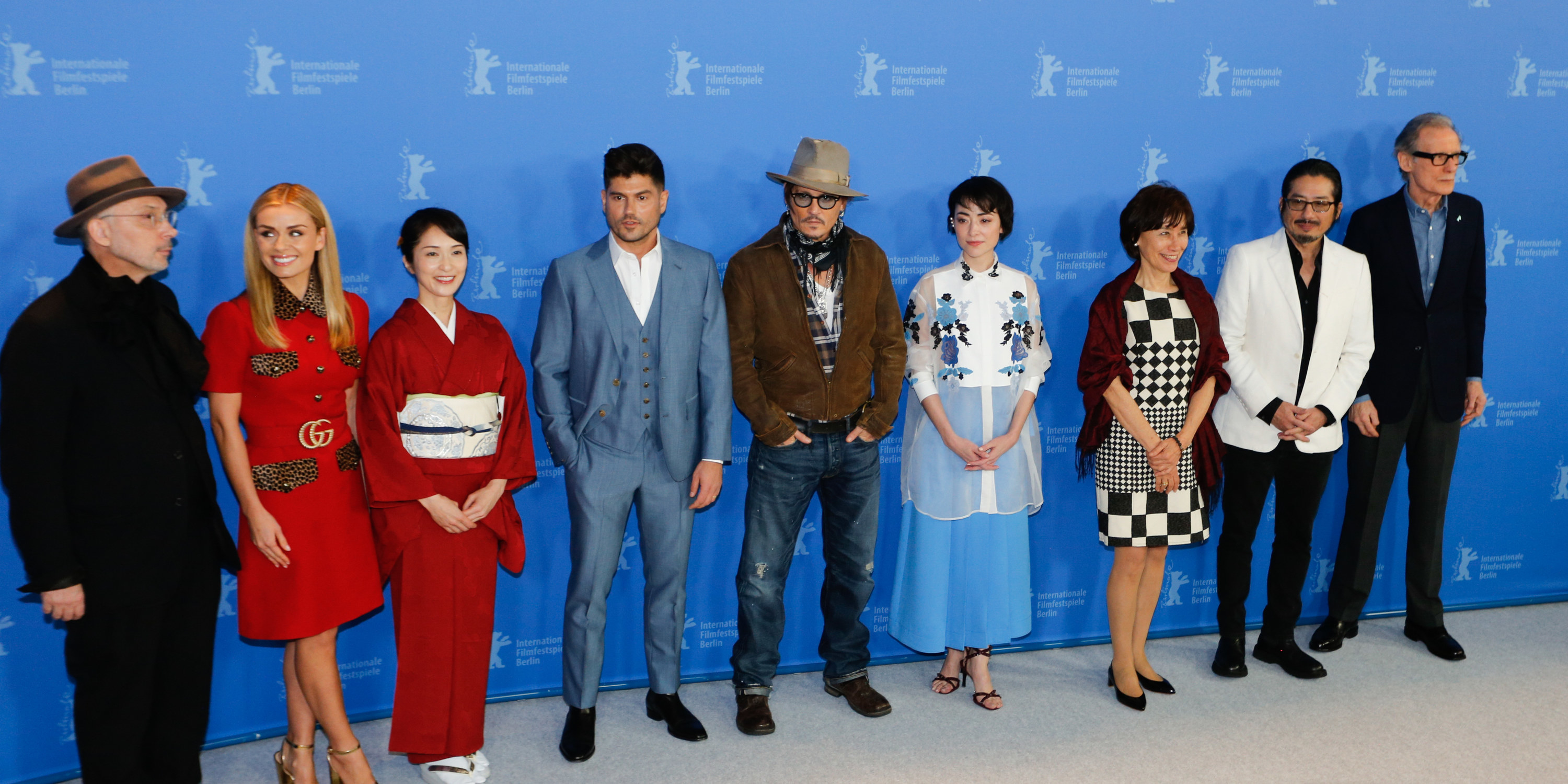 Cast and crew members of &quot;Minamata&quot; pose together as they attend the Berlinale International Film Festival in 2020