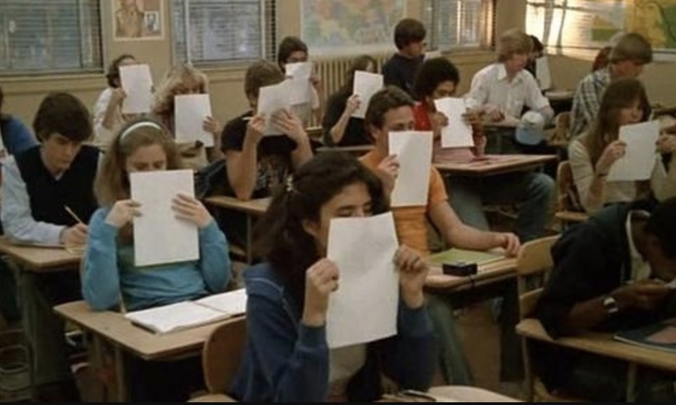 Students smelling their papers