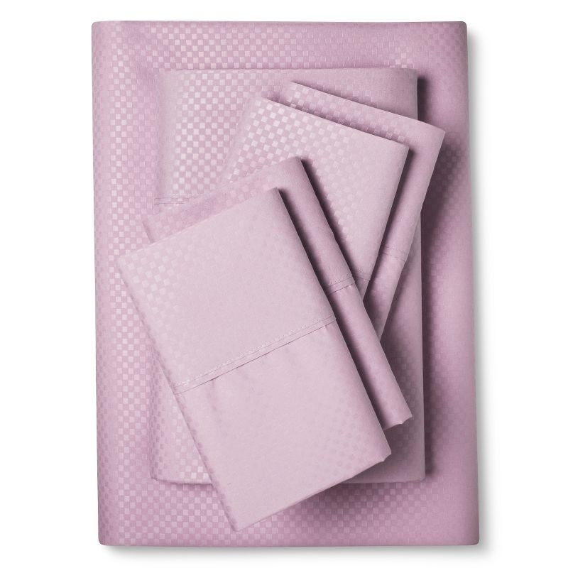 a set of lilac checkered folded sheets