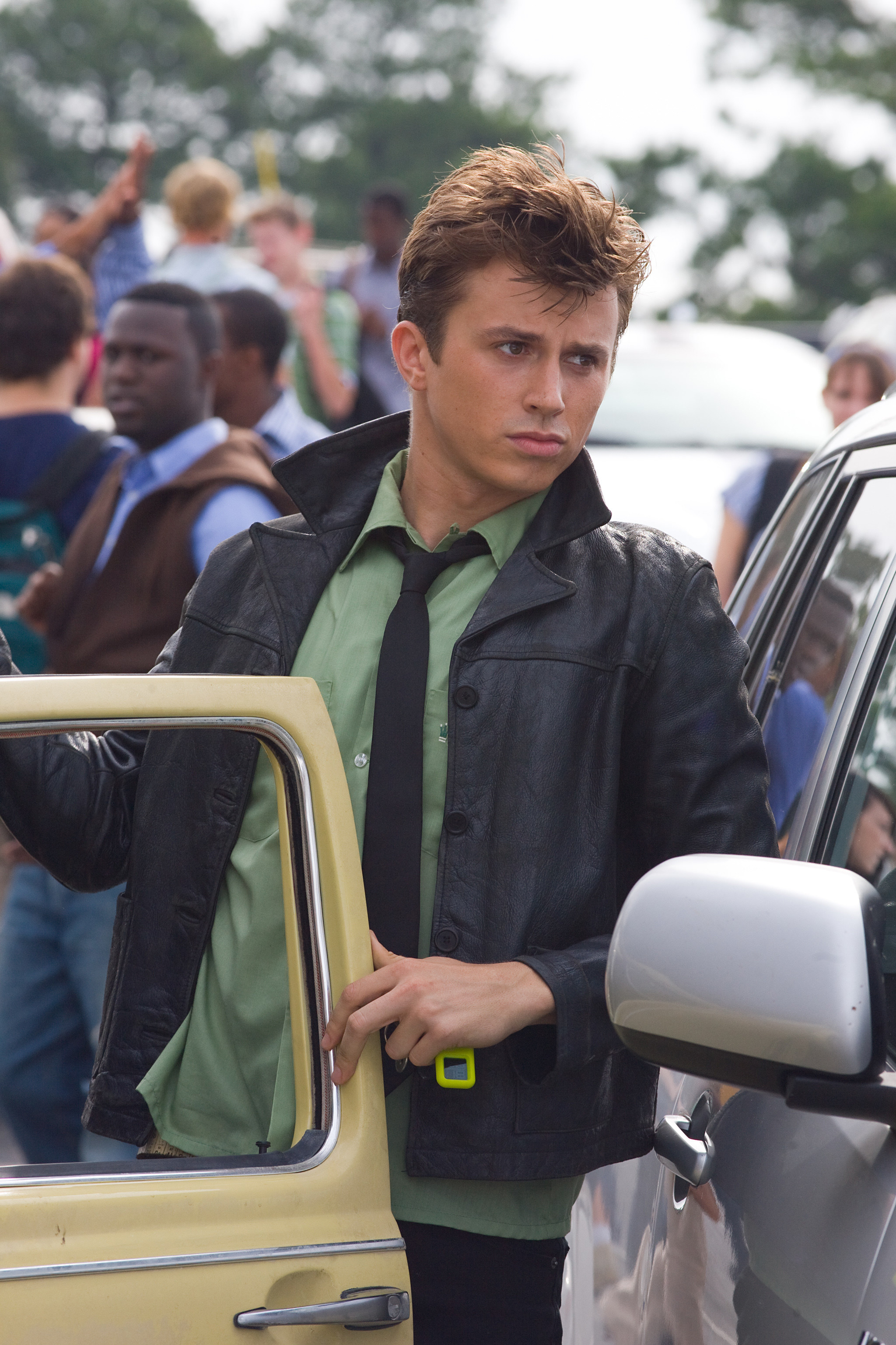 close up of Kenny Wormald getting out of a car in the film