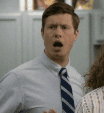 a gif of anders holm from workaholics making a shocked face