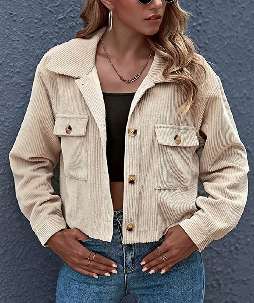 A model wearing a cropped apricot shacket