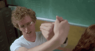 gif of napoleon dynamite moving his hands like a bird