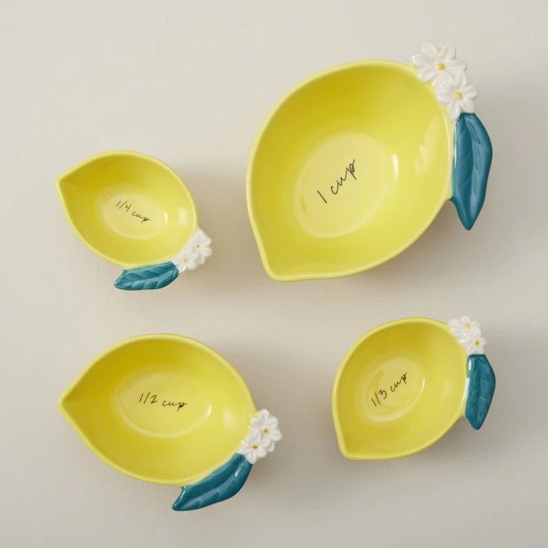 The measuring cups against a plain background