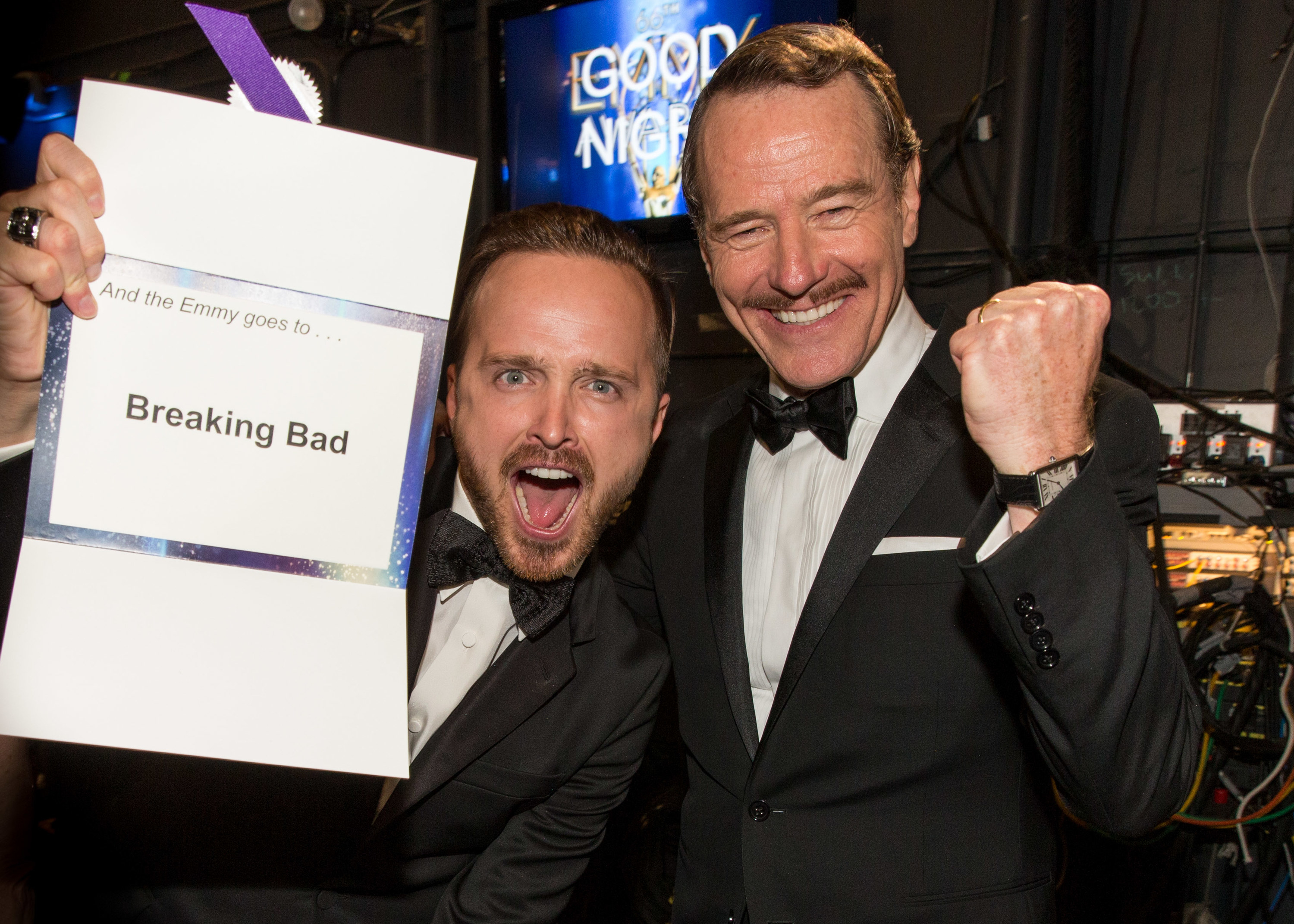 Bryan and Aaron hold the Emmy envelope that says Breaking Bad on it