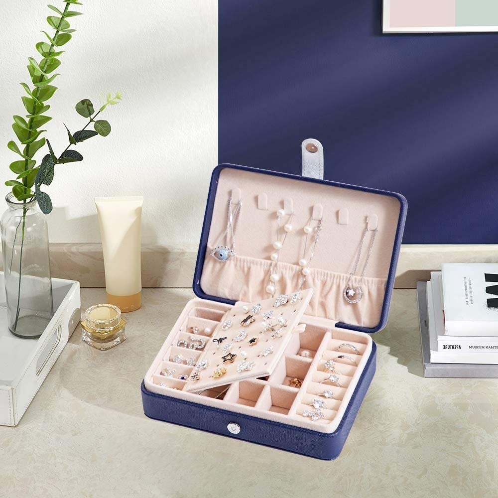 a jewelry box with jewelry placed neatly inside