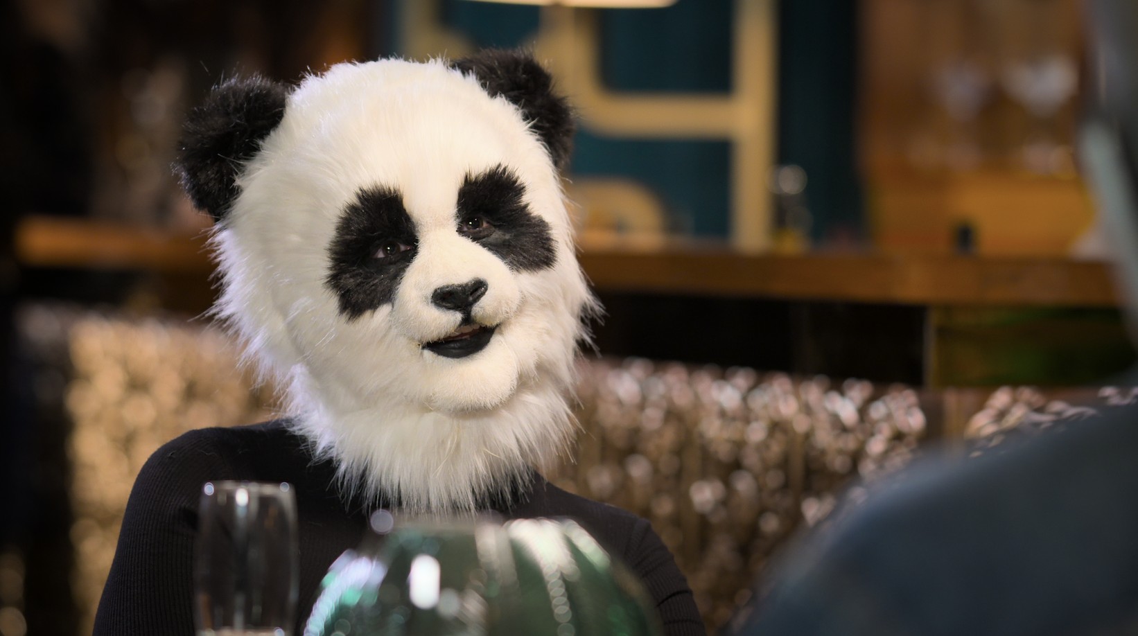 A girl dressed as a panda