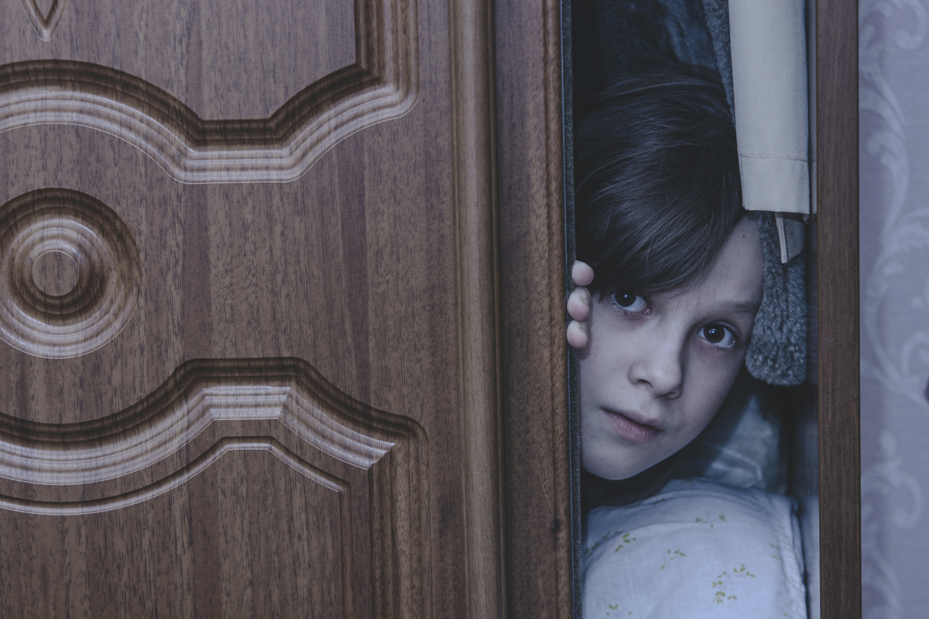 young girl in closet