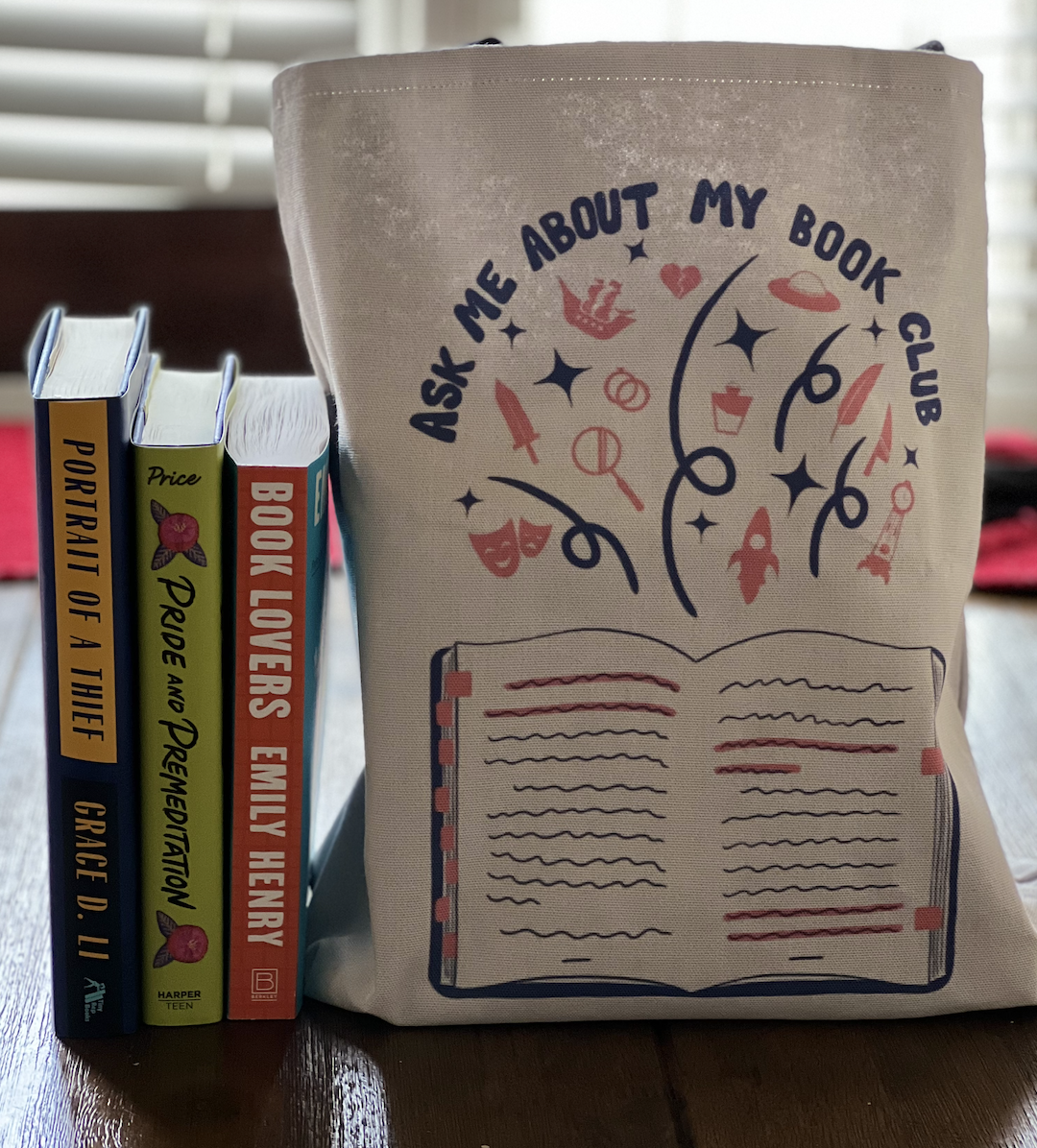 a photo of the tote bag next to books