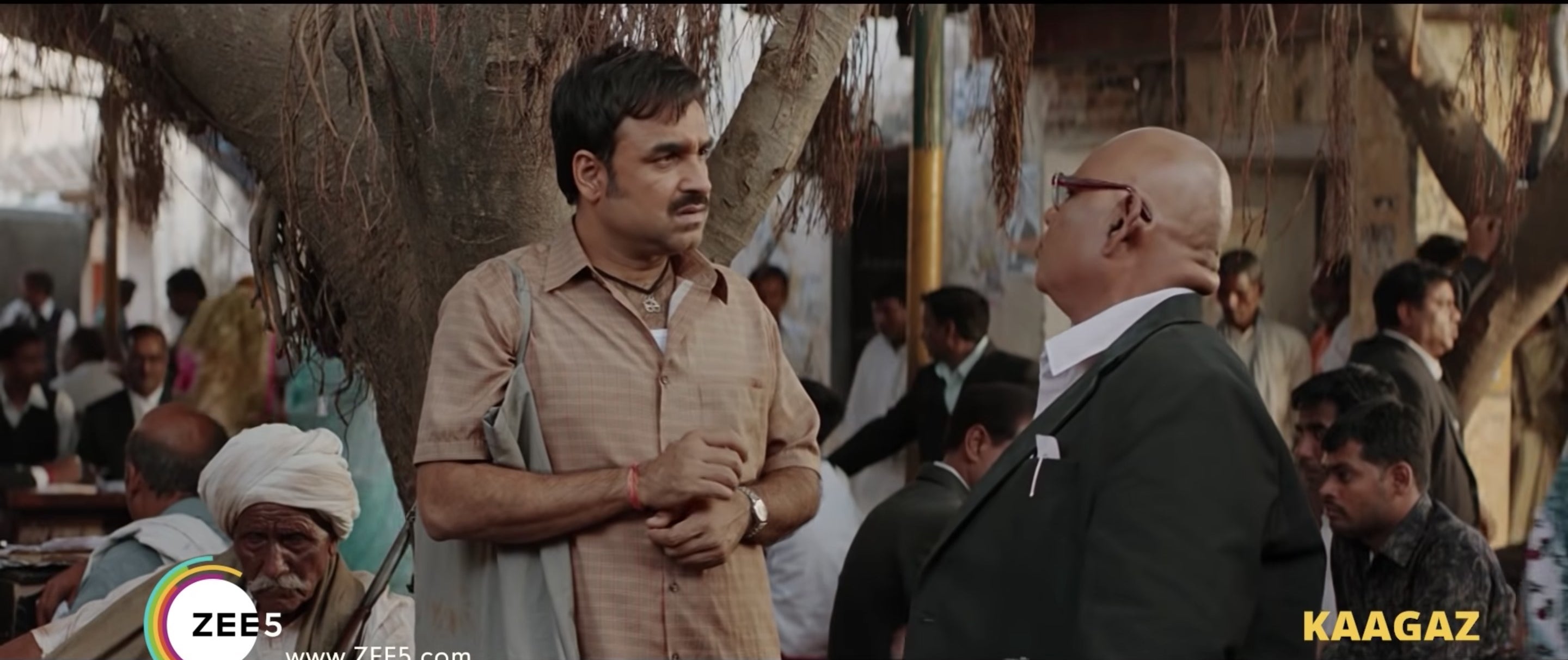 Pankaj Tripathi and Satish Kaushik in a still from Kaagaz