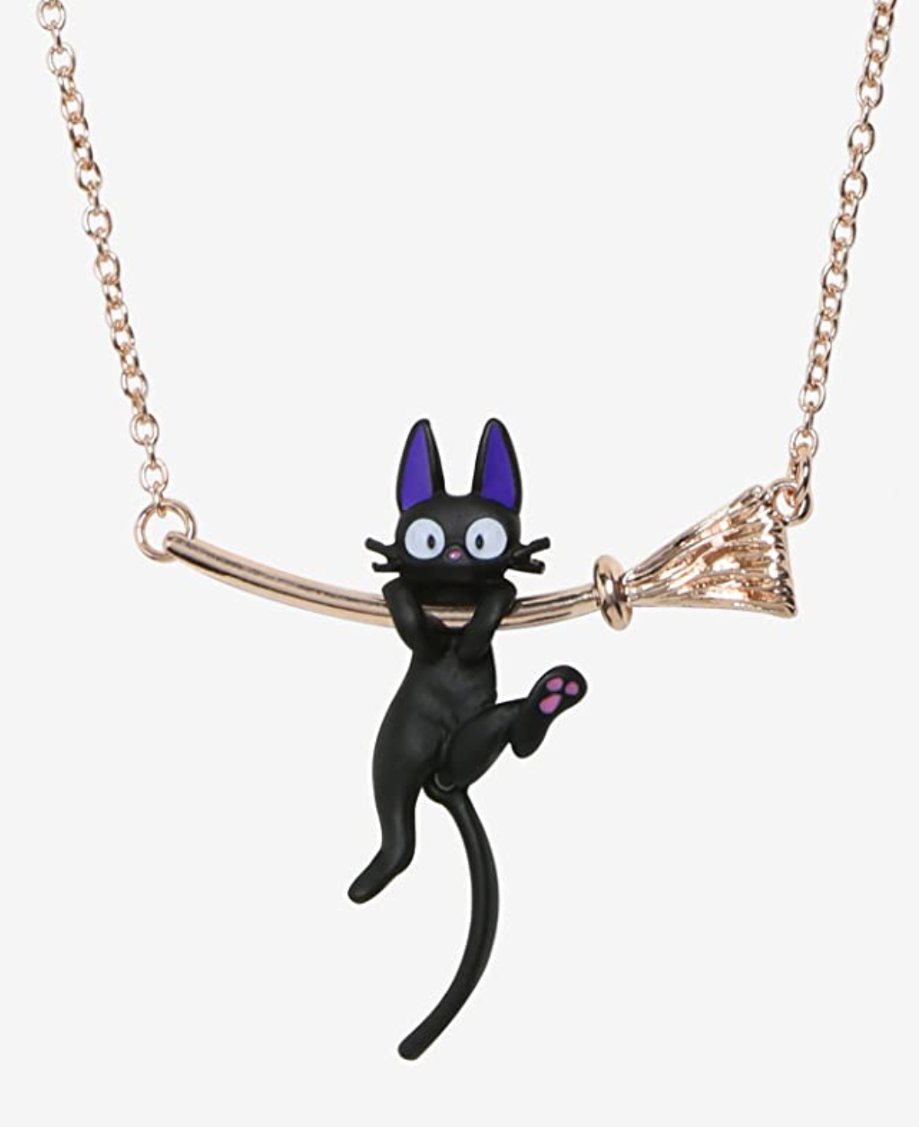 dije con la imagen de Jiji, el gato de Kiki: entregas a domicilio