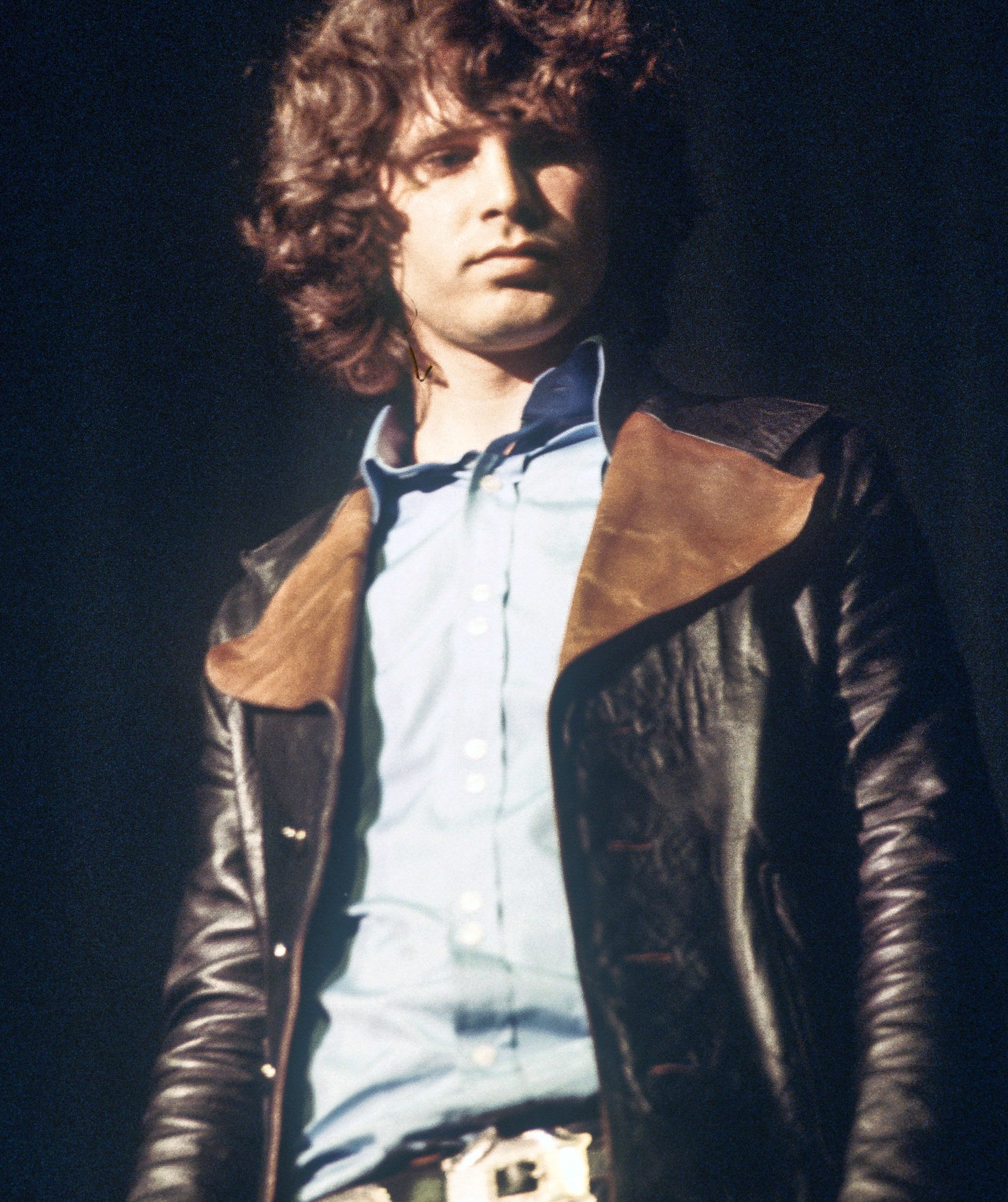 Jim Morrison looking down at something