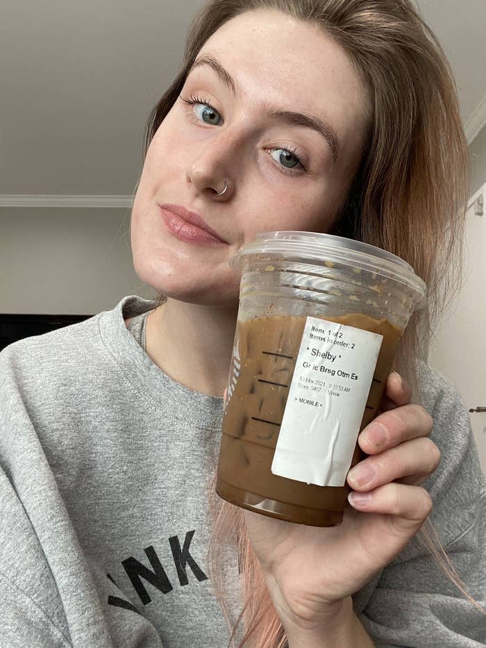 selfie of the author with a starbucks coffee