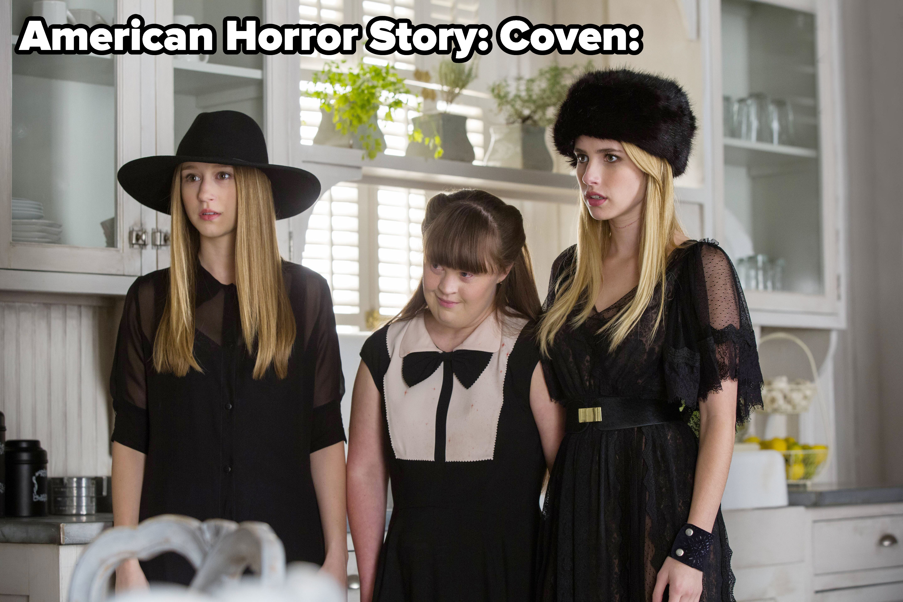 Taissa Farmiga, Jamie Brewer, Emma Roberts in American Horror Story: Coven