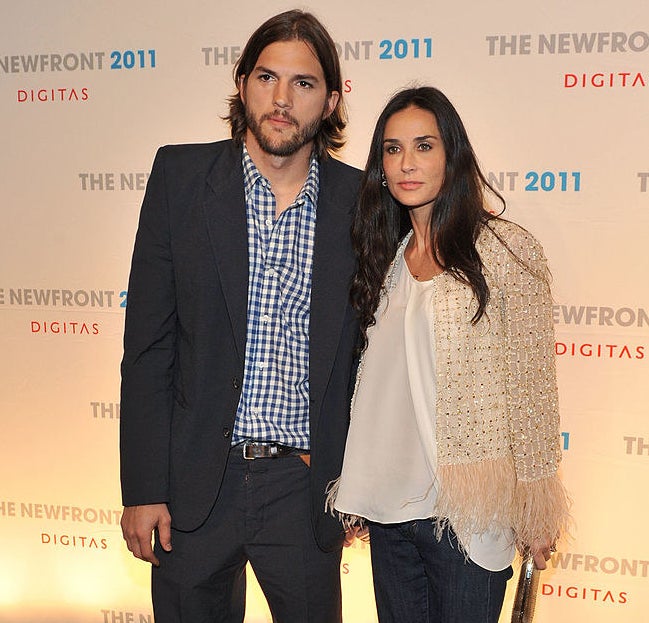 Demi Moore and Ashton Kutcher standing together