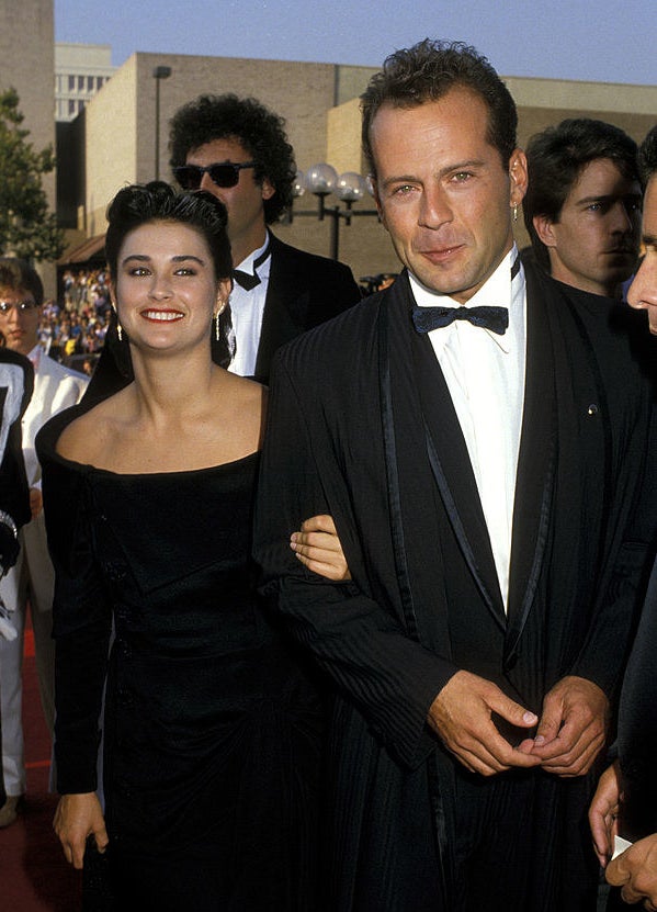 A young Demi Moore and Bruce Willis at a fancy event