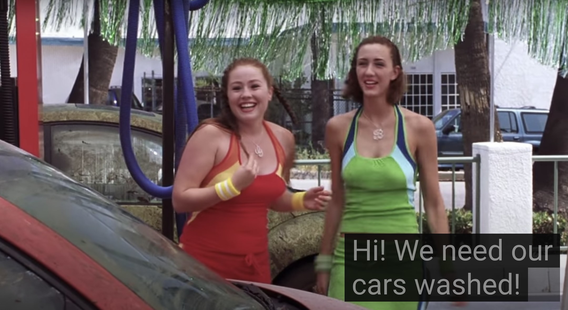 The stepsisters having covered their cars in dirt and talking to Austin about it, who works at his dads carwash