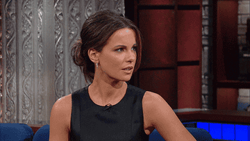 Kate Beckinsale looking surprised on a talk show