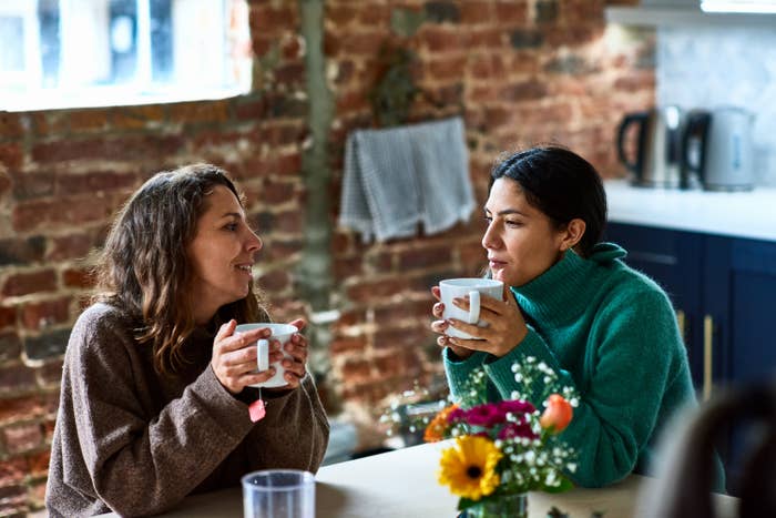Two women talking in a cafe