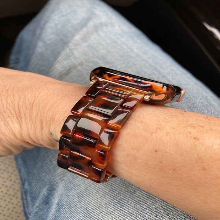 Reviewer showing side of watch band