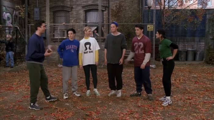 the friends playing football