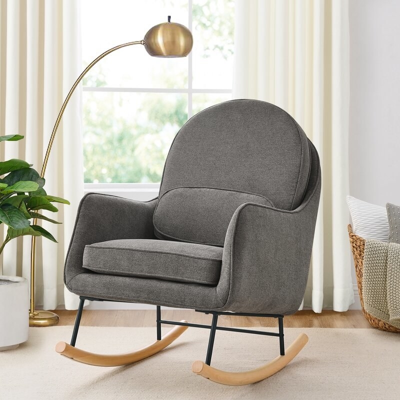 a grey rocking chair