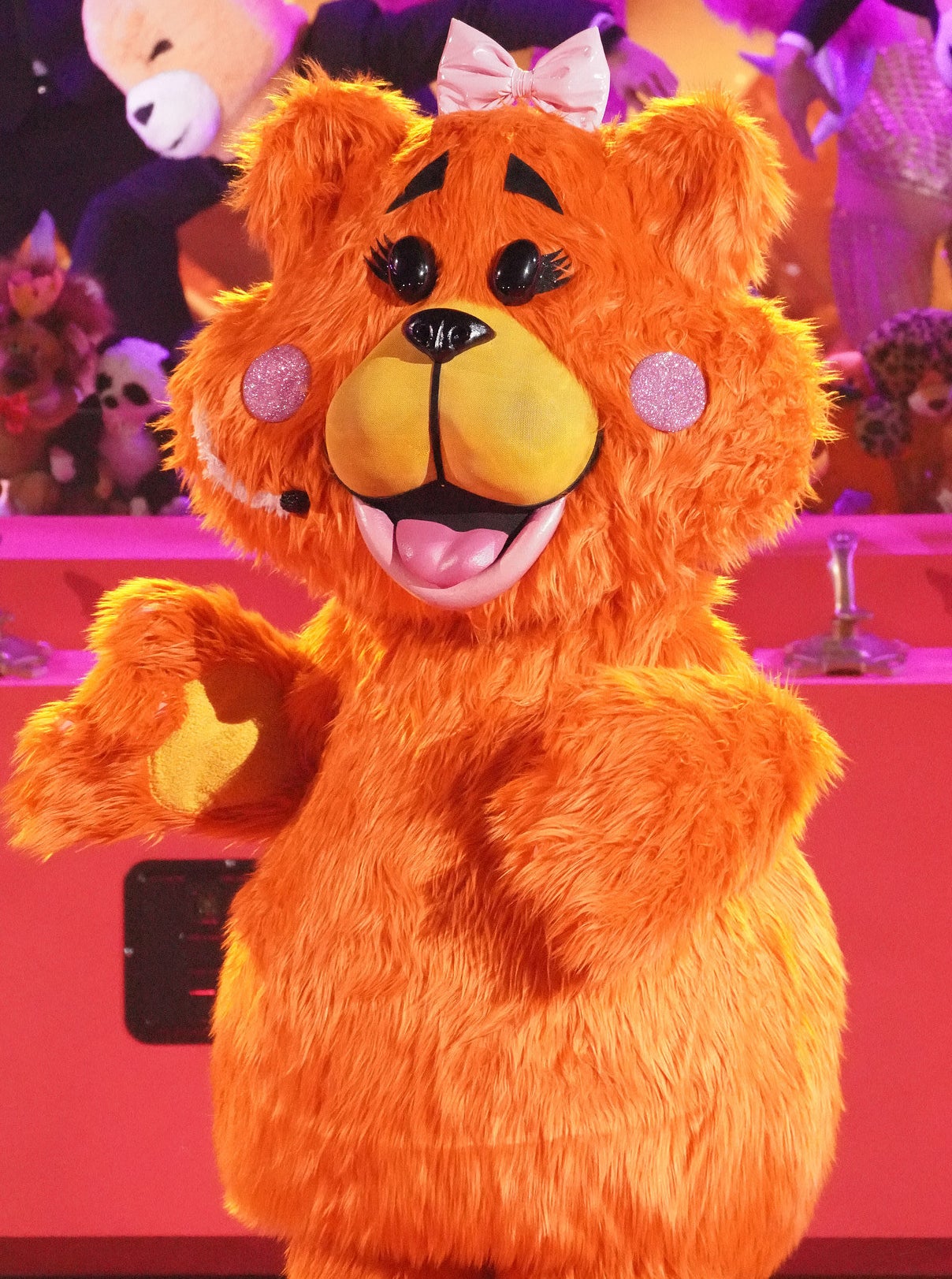 A person in a teddy bear costume
