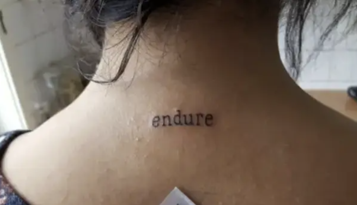 the word &quot;endure&quot; on someone&#x27;s back