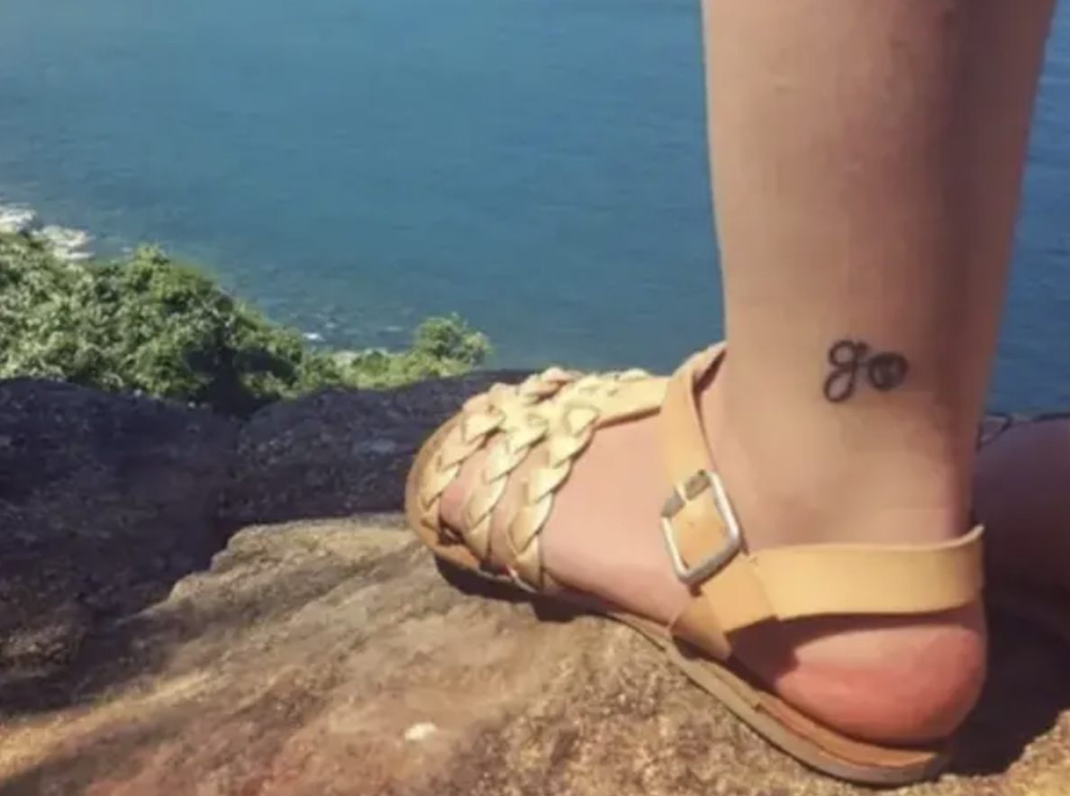 the word &quot;go&quot; tattooed on someone&#x27;s ankle