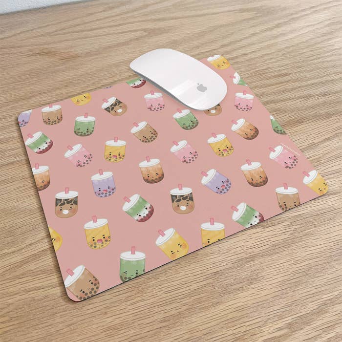Pink mouse pad of different types of boba drinks