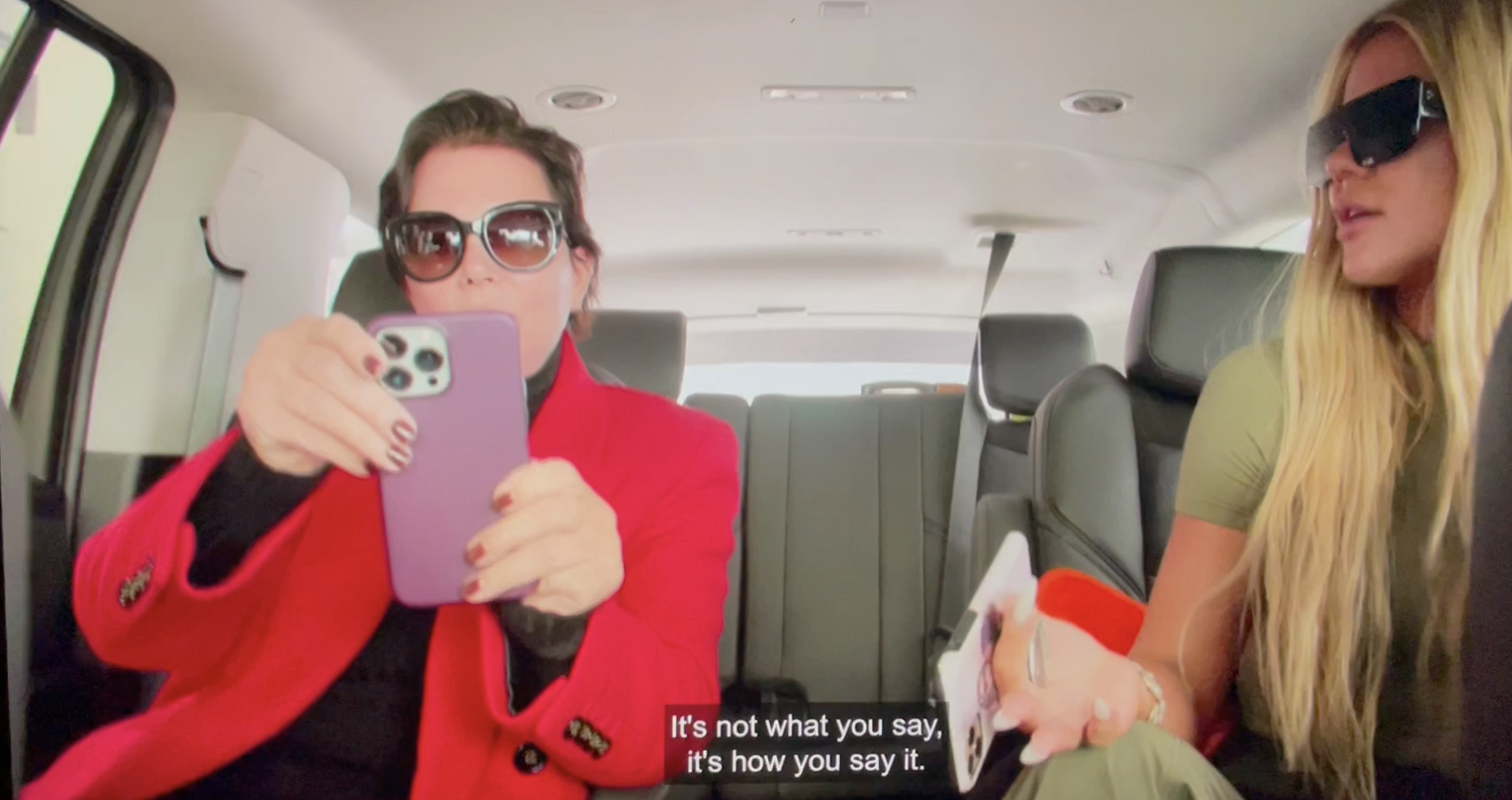 Kris Jenner and Khloe Kardashian in the backseat of a car.
