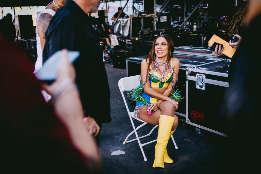 Anitta sitting backstage at Coachella.