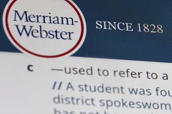 A close up of the Merriam Webster logo