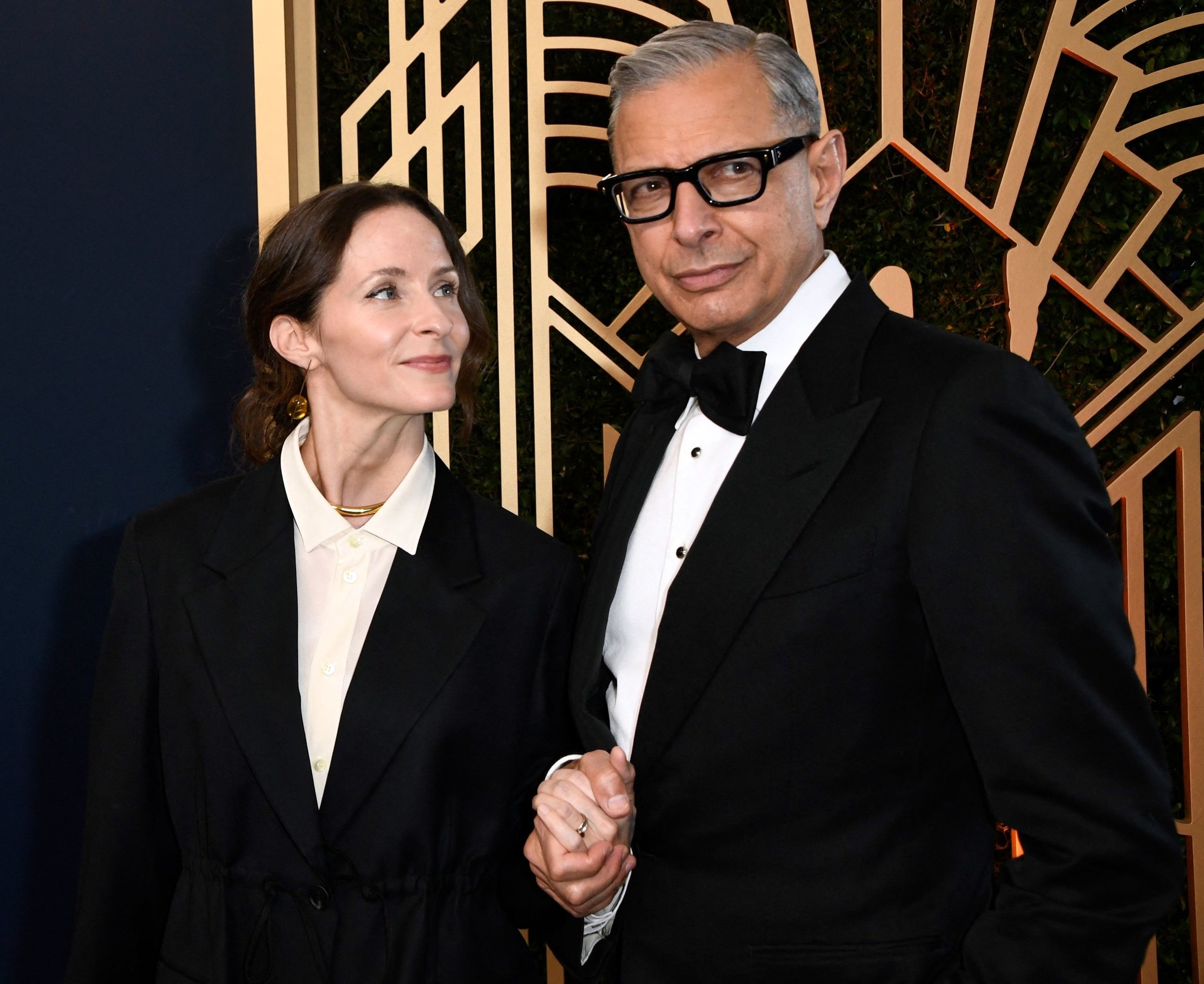 Jeff Goldblum and Emilie Livingston in tuxedos