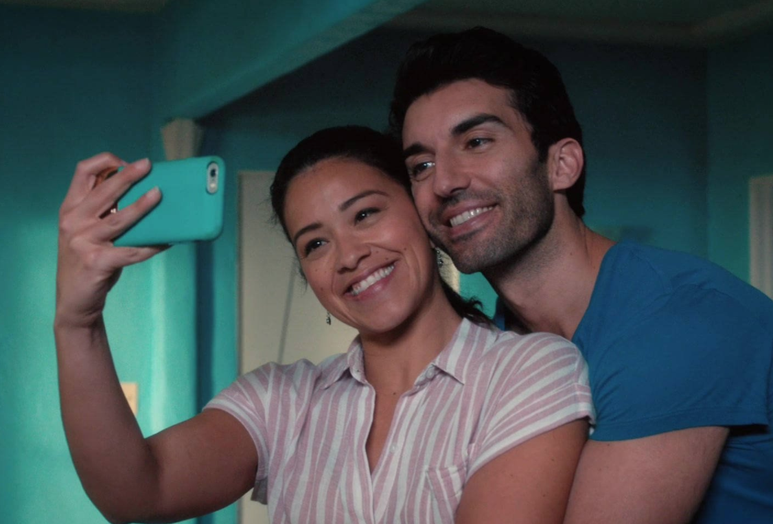 A close up of  Jane and Rafael as they take a selfie together