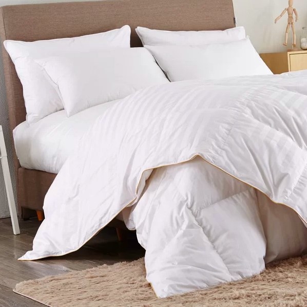 Comforter shown on a bed