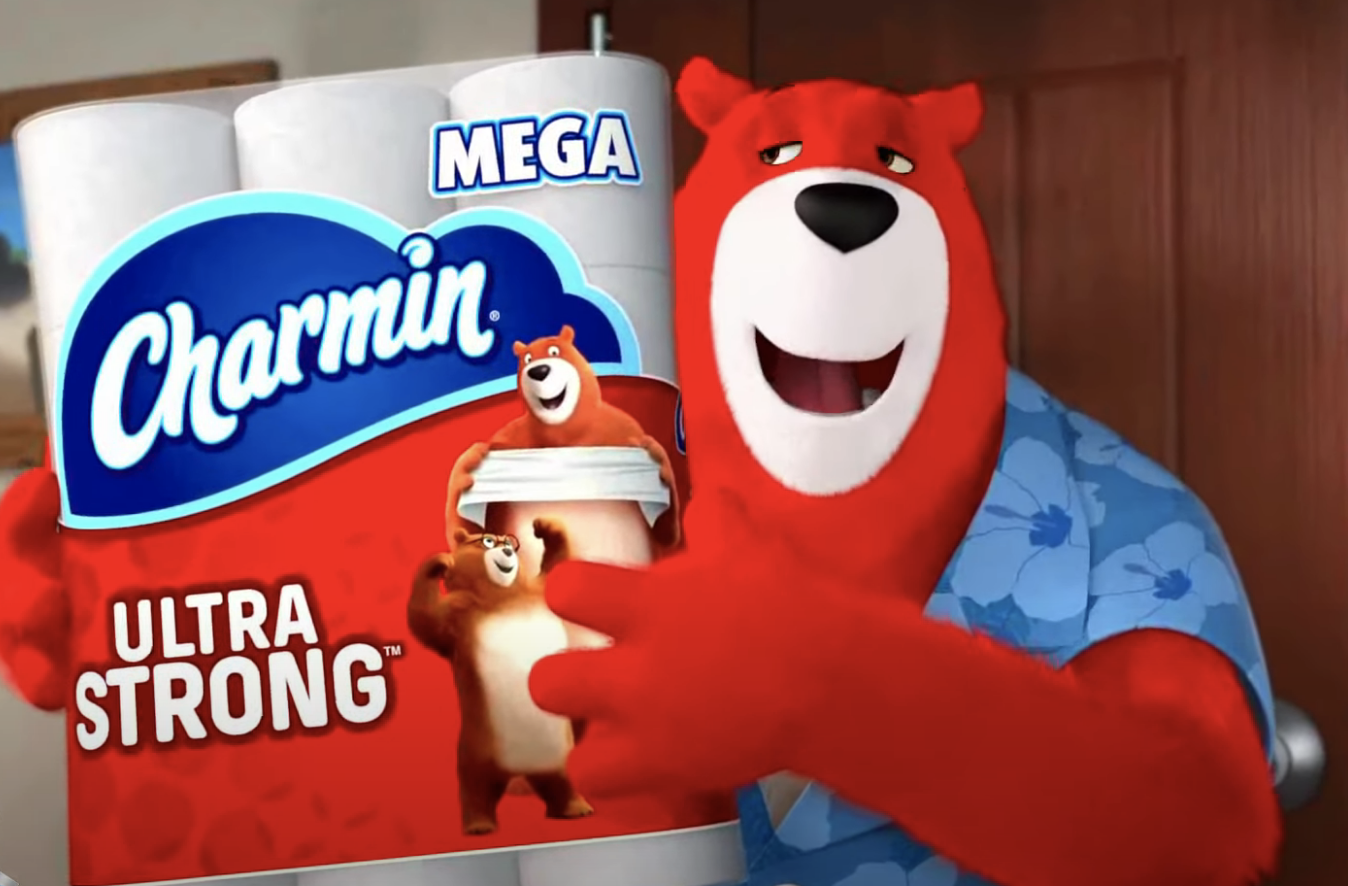 The Charmin bear holding a package of toilet paper