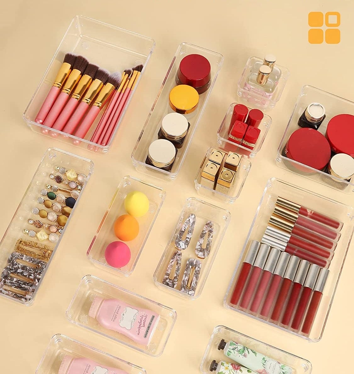 the assorted organizers filled with objects like makeup brushes, lip glosses and hair pins